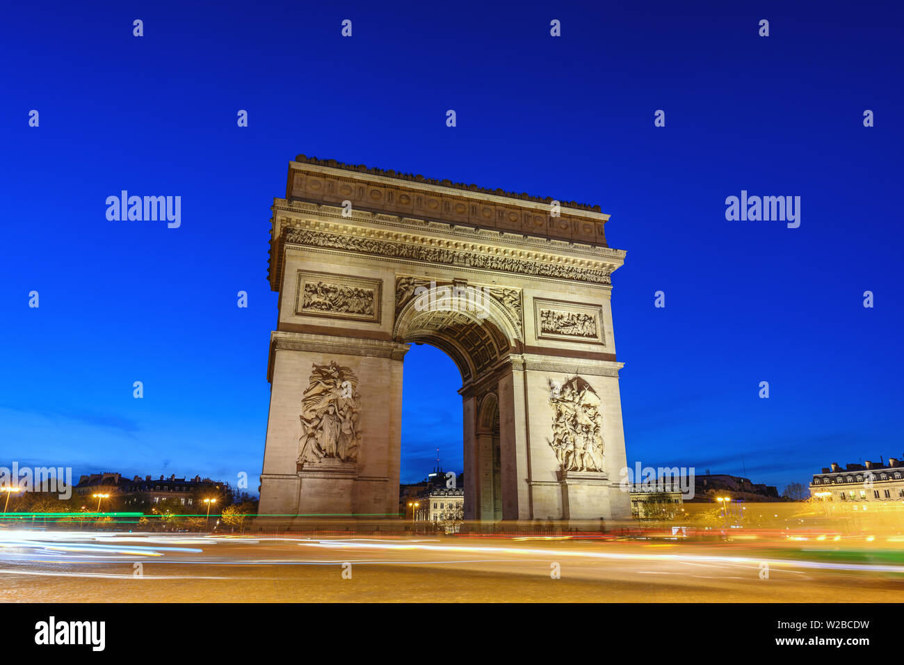 Paris France city skyline night at Arc de Triomphe and Champs Elysees Stock Photo