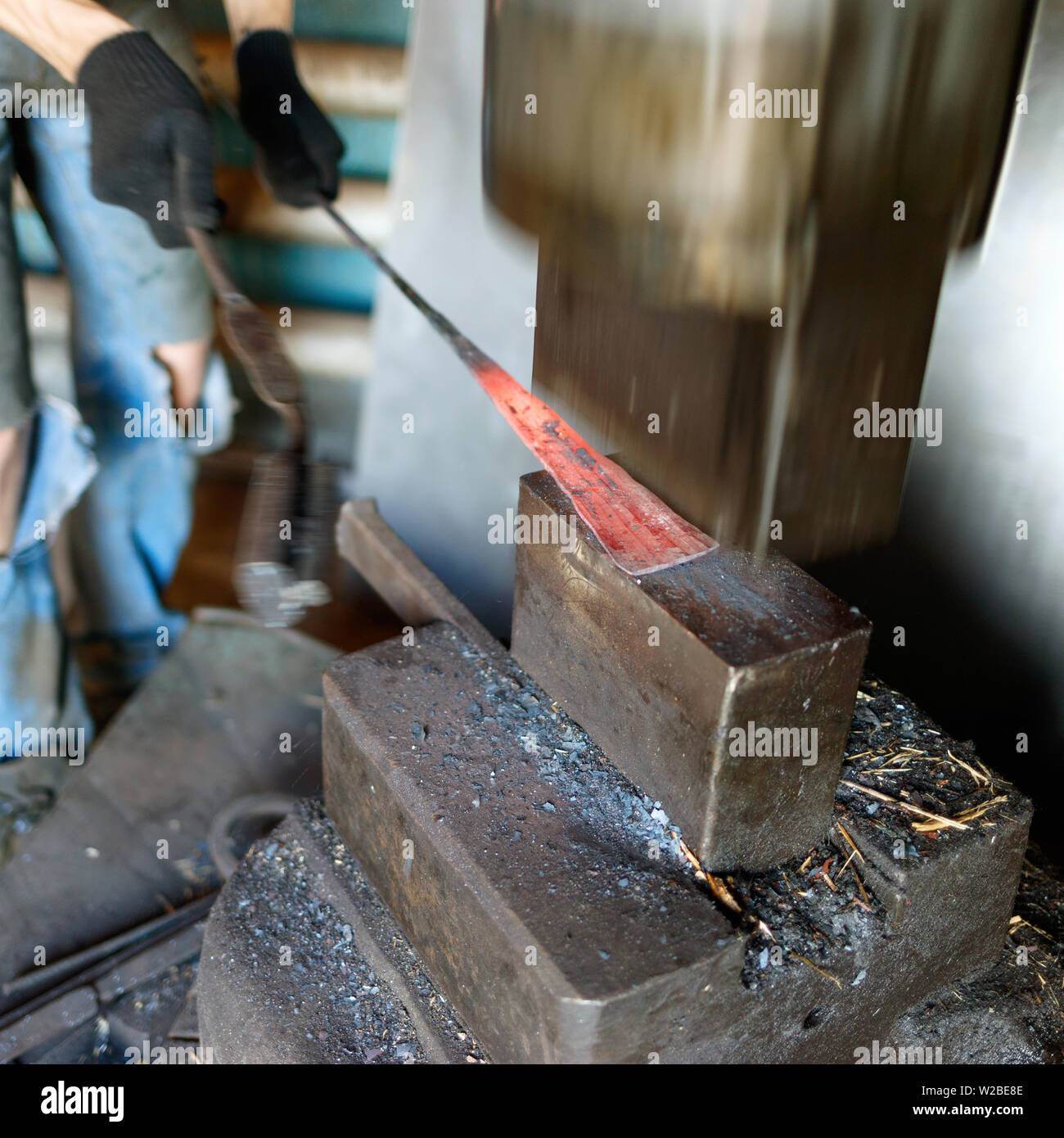 Blacksmith by using pneumatic hammer Stock Photo Alamy