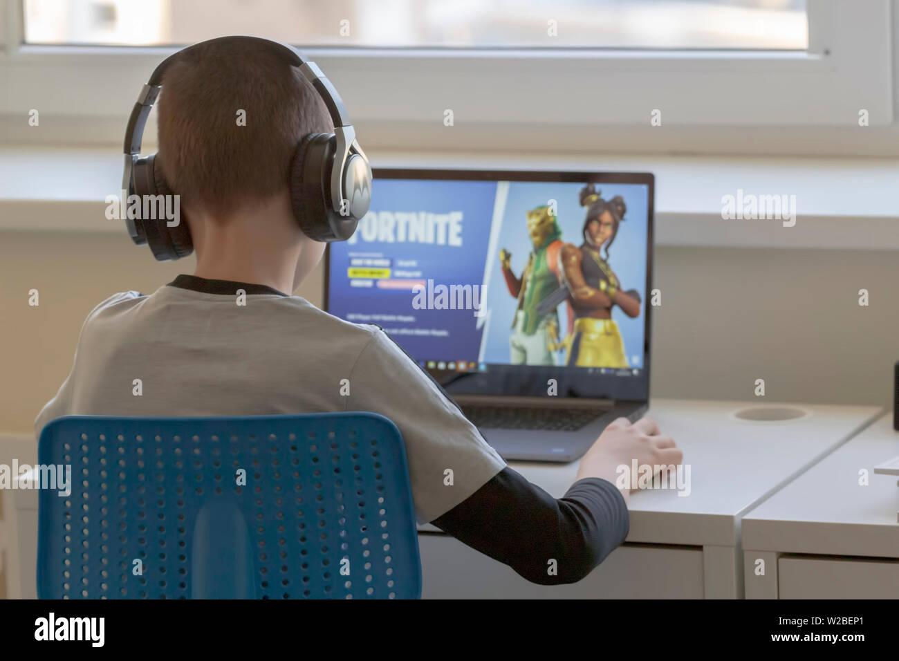 Vilnius, Lithuania March 2, 2019 Child playing Fortnite game