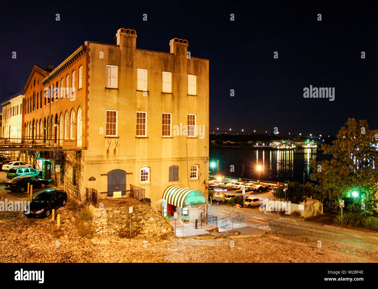 Historic buildings line the riverfront in beautiful Savannah, Georgia. Stock Photo