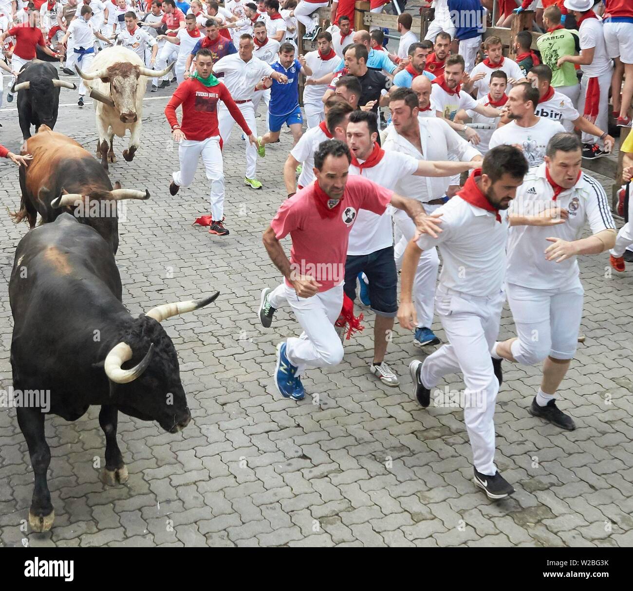 Pamplona, Spain. 08th July, 2019. Participants run ahead of Puerto de  Cebada Gago's fighting bulls on the second day of the San Fermin bull run  festival in Pamplona, Spain on July 8,