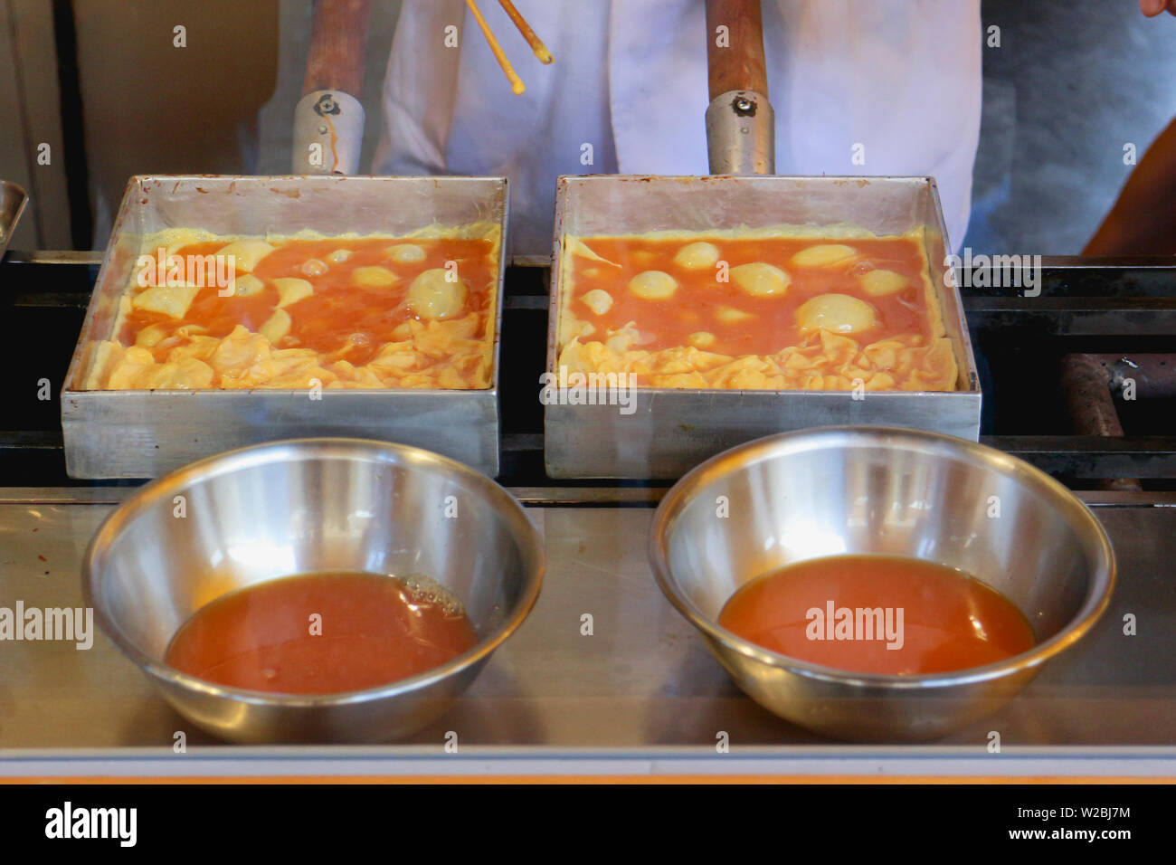 Japanese egg omelette making Stock Photo - Alamy