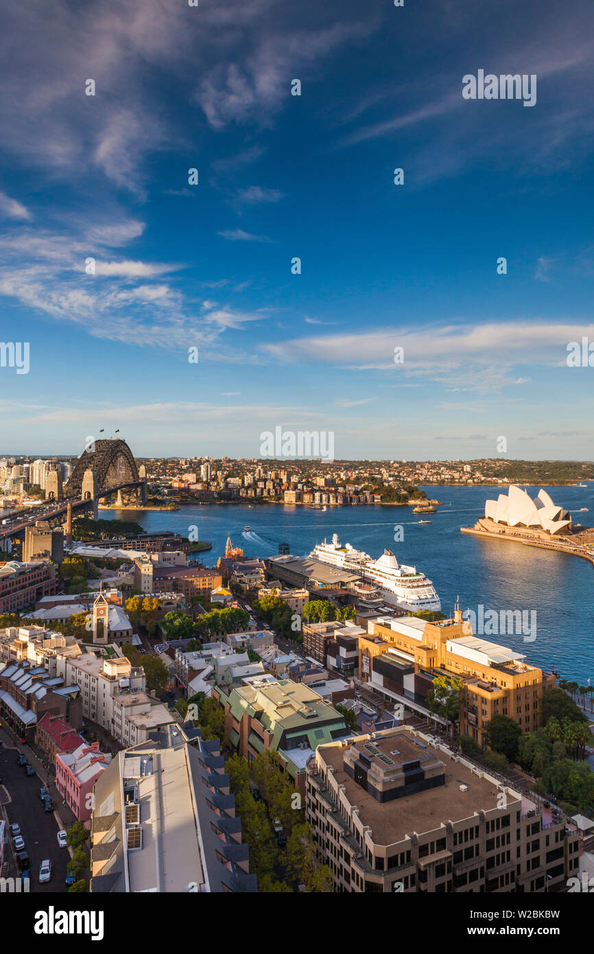 Australia, New South Wales, NSW, Sydney, The Rocks area, Sydney Harbour Bridge and Sydney Opera House, elevated view, late afternoon Stock Photo
