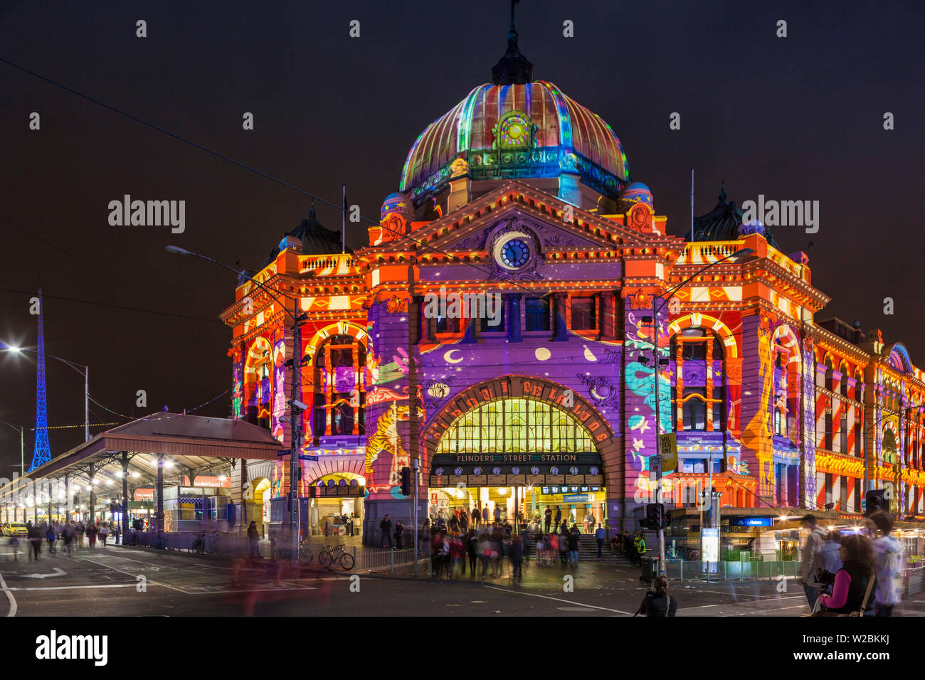 Australia, Victoria, VIC, Melbourne, Flinders Street Train Station, lit with projected laser designs, White Nights Festival Stock Photo