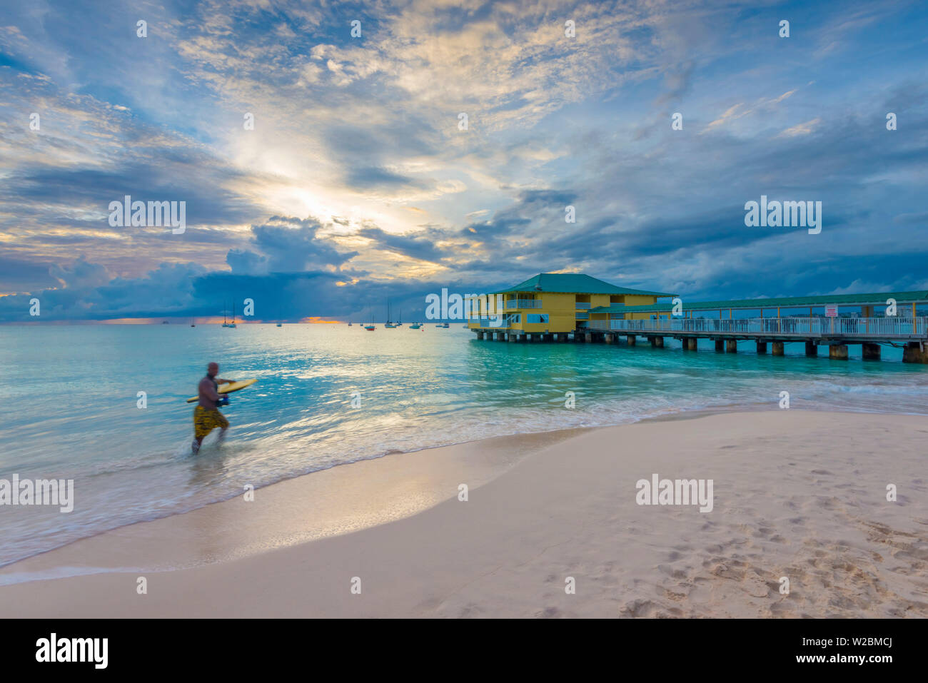 Caribbean, Barbados, Bridgetown, Carlisle Bay, Pebbles Beach at sunset Stock Photo
