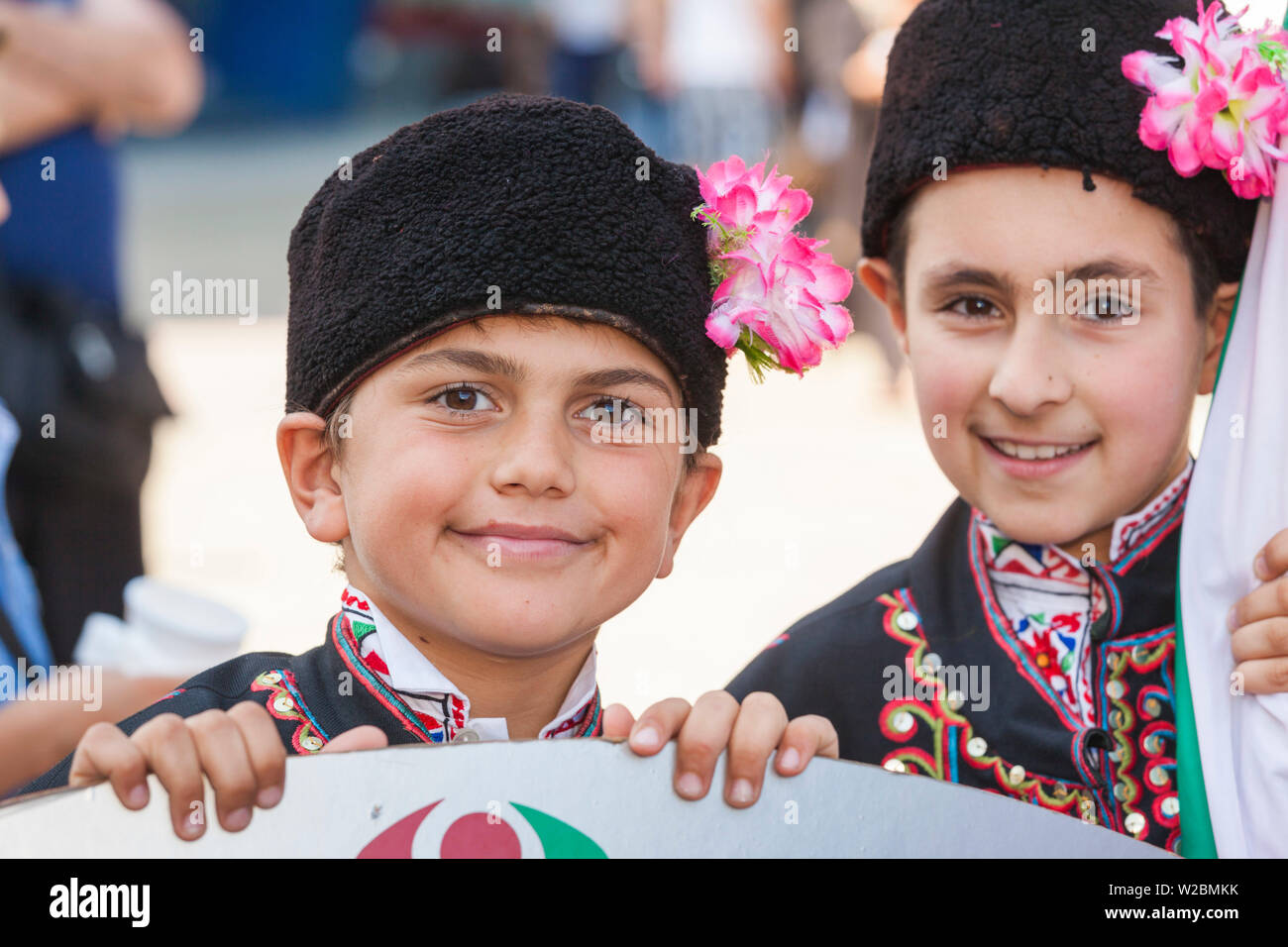 Bulgaria, Central Mountains, Kazanlak, Kazanlak Rose Festival, town produces 60% of the world's rose oil, young boys in traditional costumes, NR Stock Photo