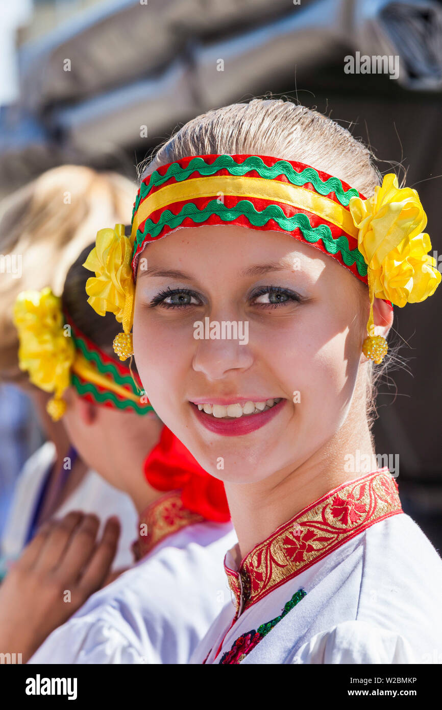 Bulgaria, Central Mountains, Kazanlak, Kazanlak Rose Festival, town produces 60% of the world's rose oil, young girl dancer in traditional costume, NR Stock Photo