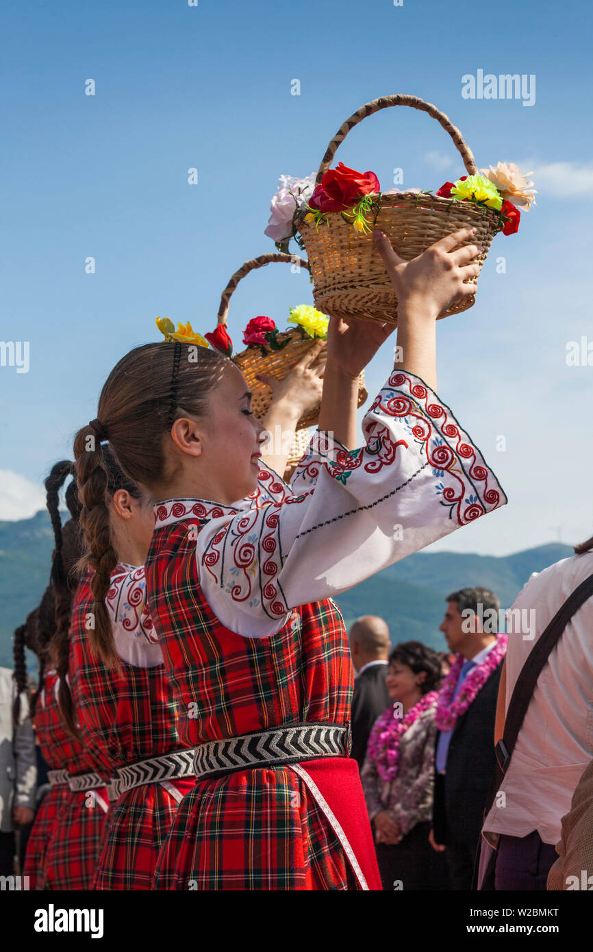 Bulgaria, Central Mountains, Kazanlak, Kazanlak Rose Festival, town produces 60% of the world's rose oil, dancers in traditional costume at the rose harvest dance, NR Stock Photo