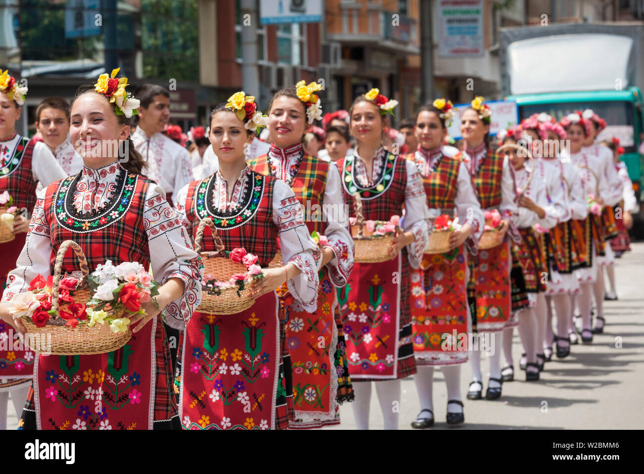 Bulgaria, Central Mountains, Kazanlak, Kazanlak Rose Festival, town produces 60% of the world's rose oil, Rose Parade, young women in traditional costumes, NR Stock Photo