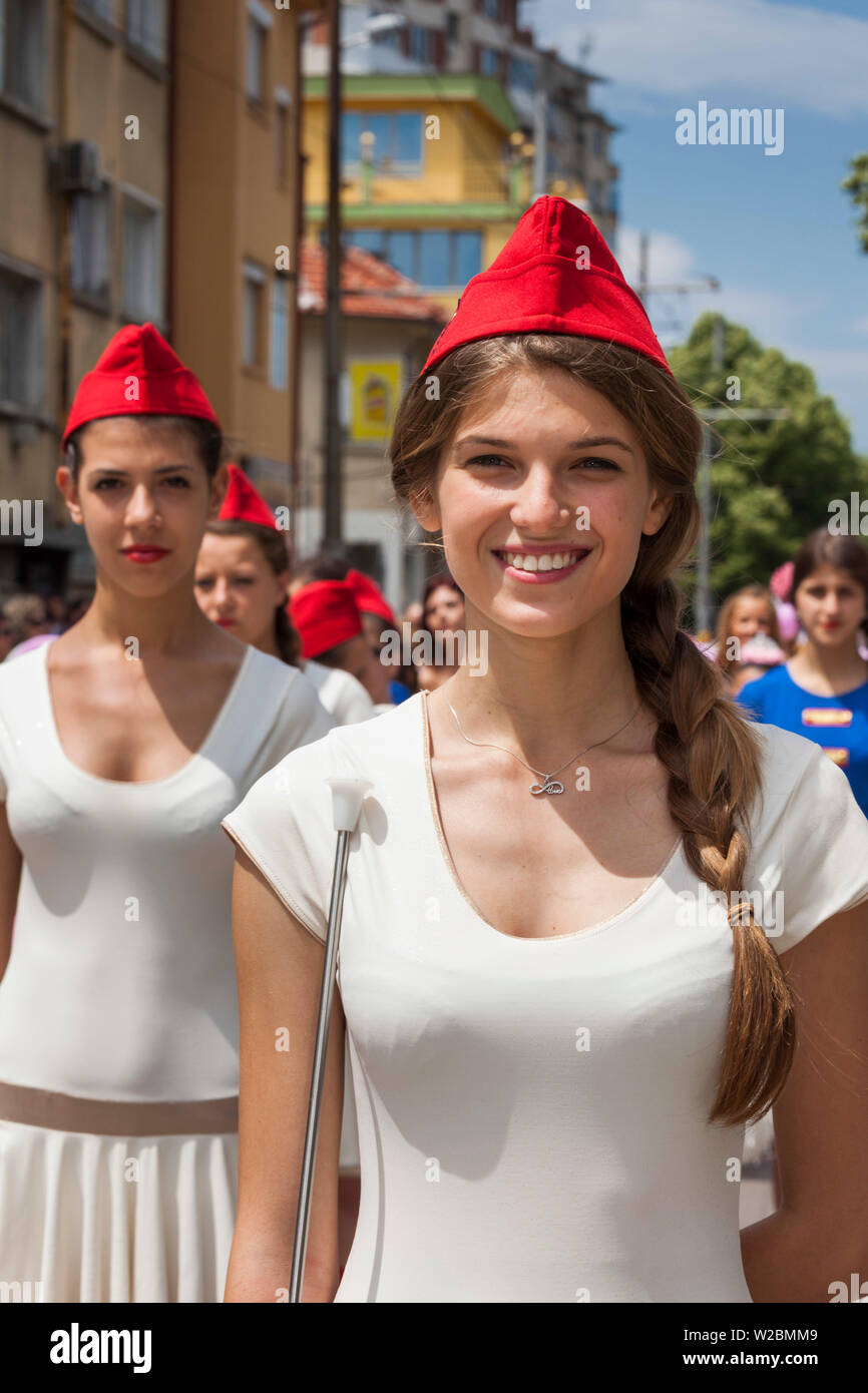 Bulgaria, Central Mountains, Kazanlak, Kazanlak Rose Festival, town produces 60% of the world's rose oil, young girls in drill team uniforms, NR Stock Photo
