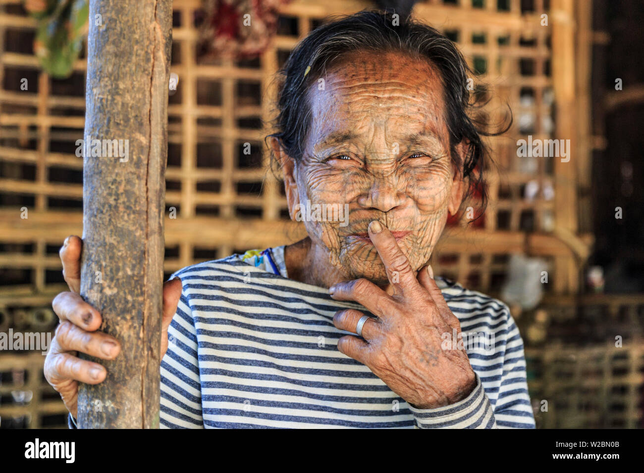 Myanmar (Burma), Rakhine State, Mrauk U, portrait of Chin Elderly woman with traditional tattoed face Stock Photo