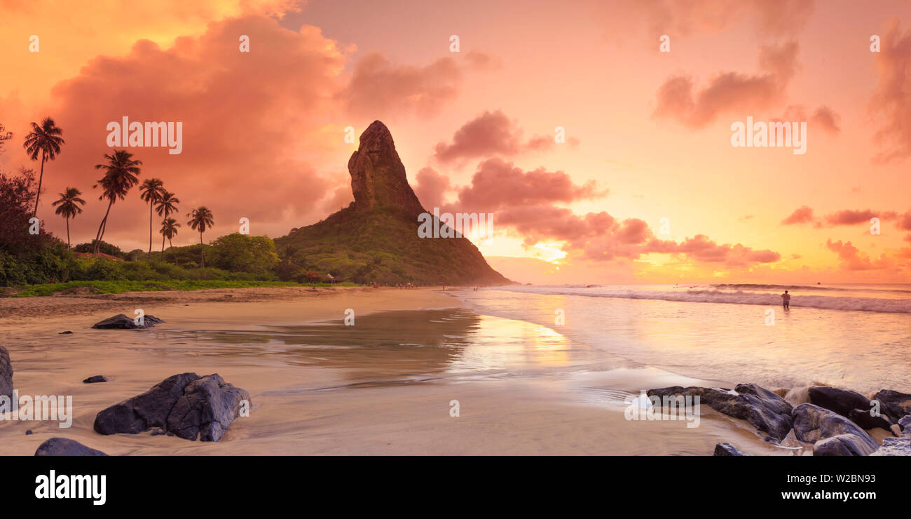 Brazil, Fernando de Noronha, Conceicao beach with Pico de Morro mountain in the background Stock Photo