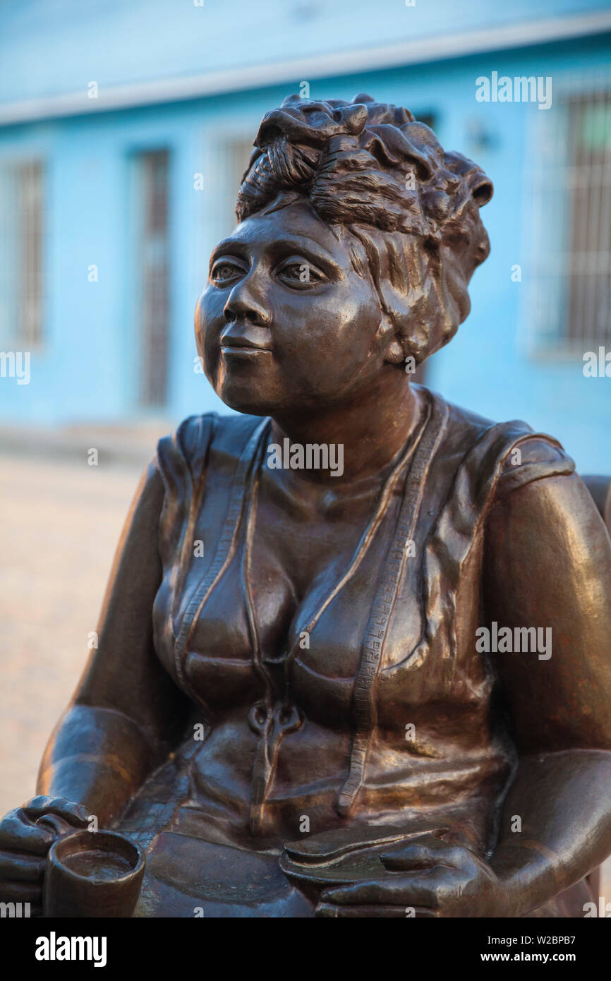 Cuba, Camaguey, Camaguey Province, Plaza Del Carmen, Iglesia de Nuestra Senora del Carmen and Unique life-sized sculptures of camagueyanos going about their daily life Stock Photo