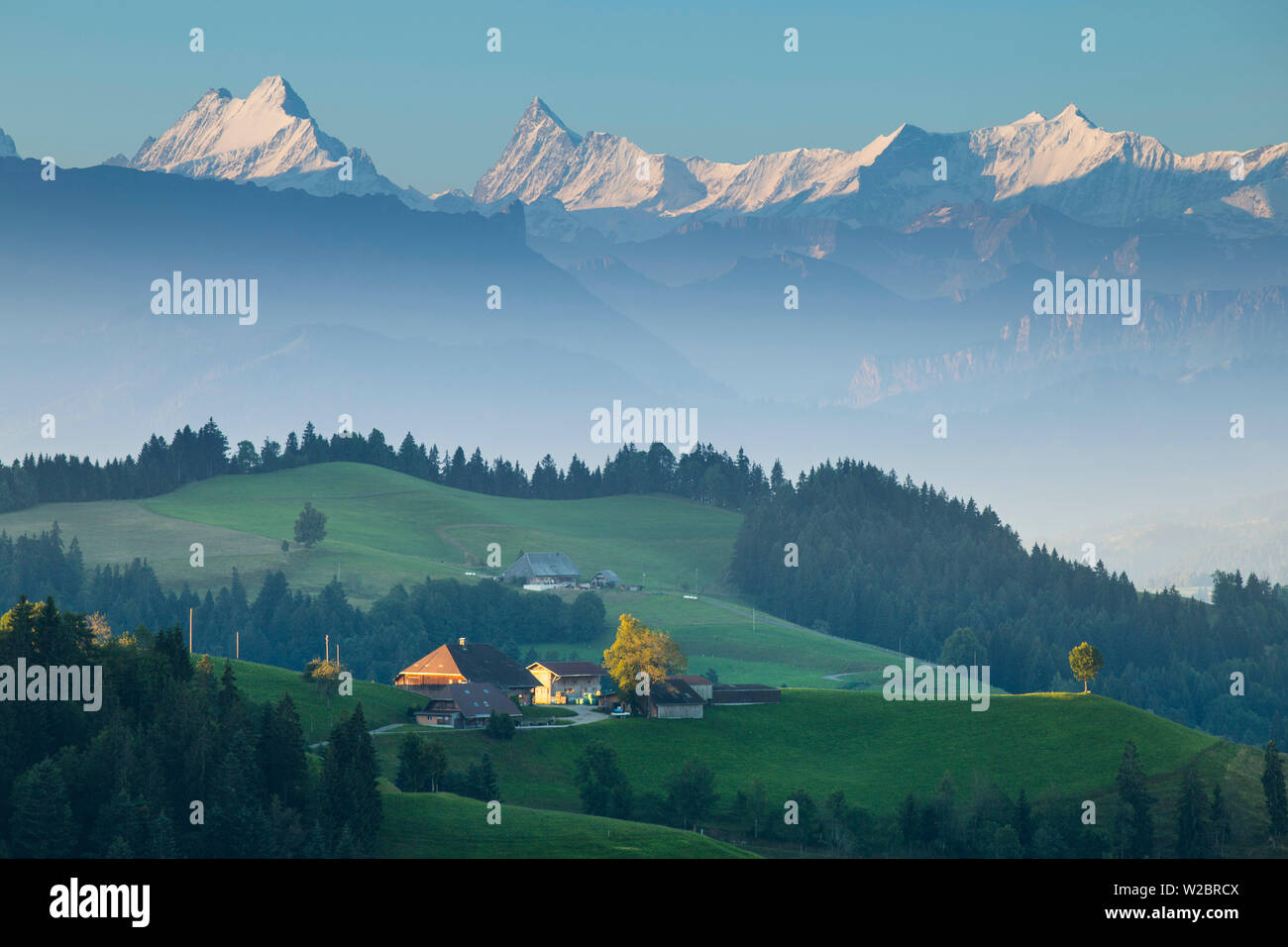 Emmental Valley and Swiss alps in the background, Berner Oberland, Switzerland Stock Photo