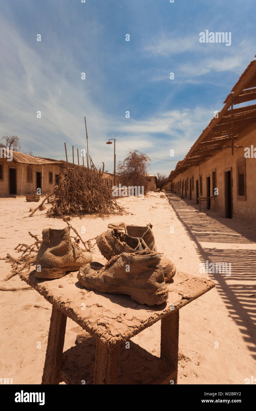 Chile, Officina Pedro de Valdivia, former saltpeter mining ghost town, old shoes Stock Photo