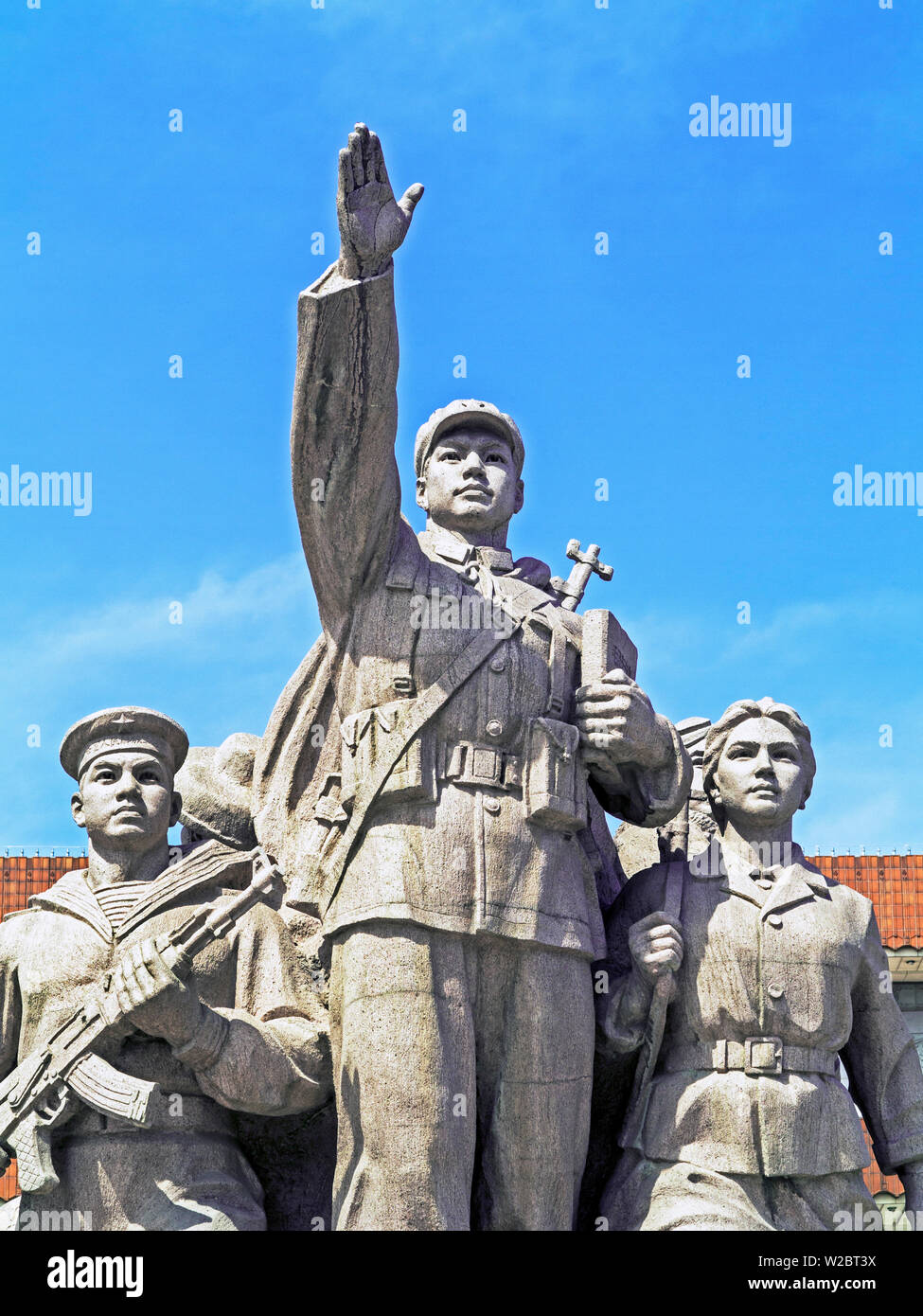 China, Beijing, Statue of marching Chinese army soldiers in front of