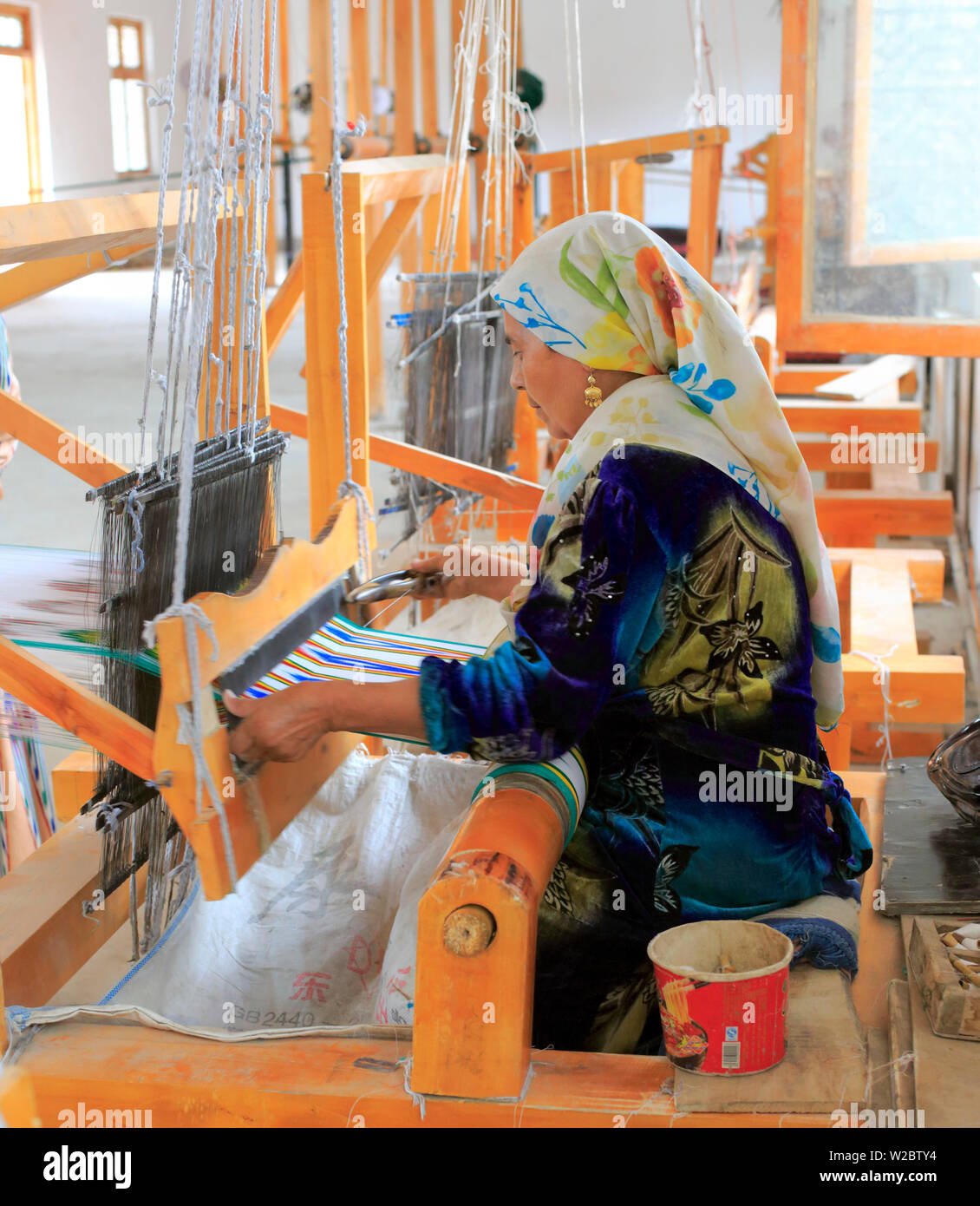 Silk production factory, Hotan, Hotan Prefecture, Xinjiang Uyghur Autonomous Region, China Stock Photo