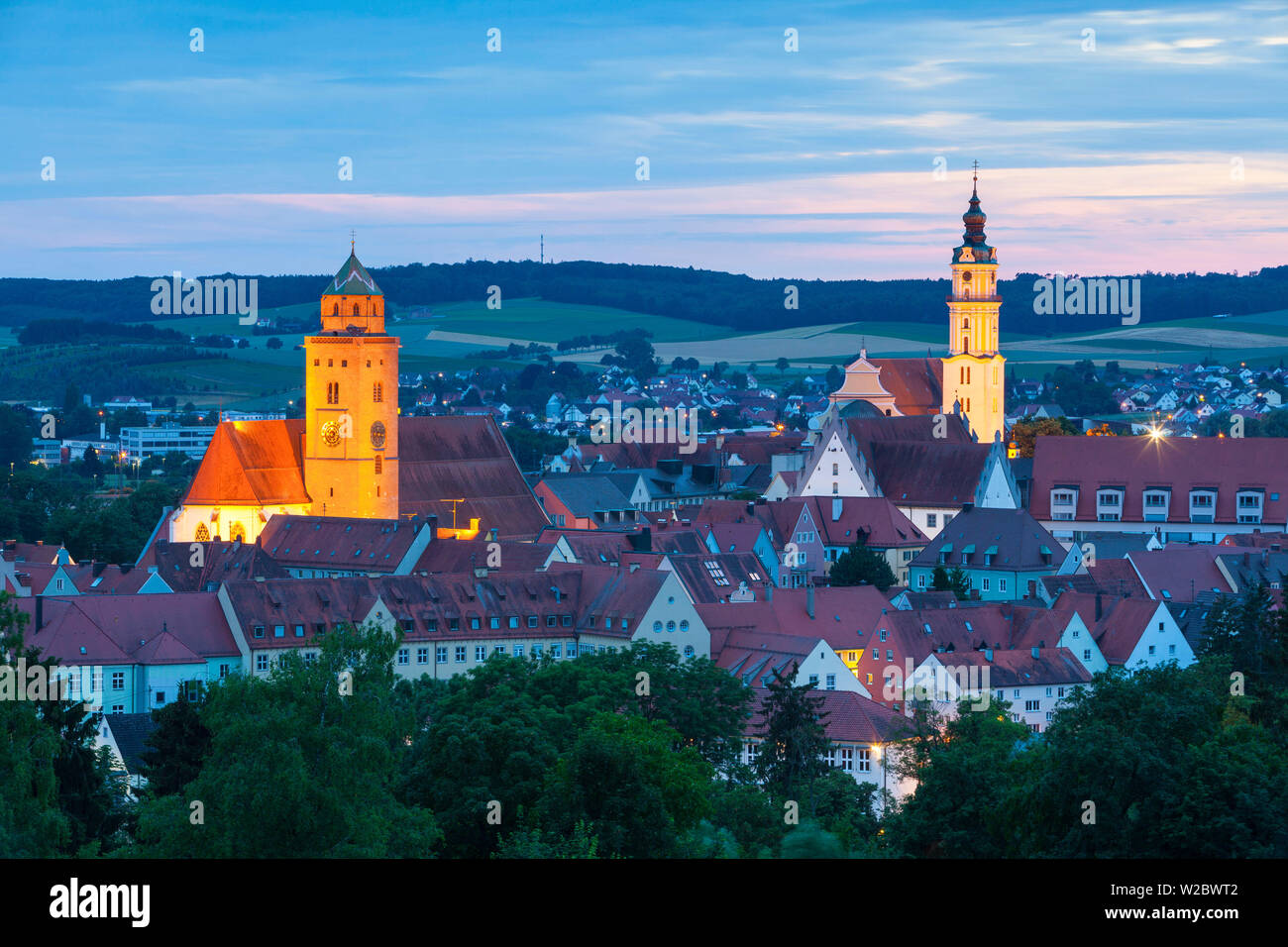 Elevated view over Donauworth Old Town illuminated at Dusk, Donauworth, Swabia, Bavaria, Germany Stock Photo