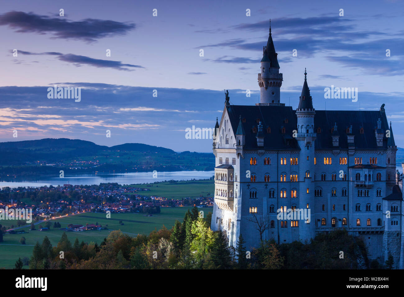 Germany, Bavaria, Hohenschwangau, Schloss Neuschwanstein castle, Marienbrucke bridge view, dusk Stock Photo