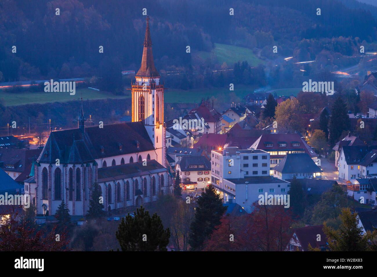 Germany, Baden-Wurttemburg, Black Forest, Titisee-Neustadt, Neustadt town, elevated view with town church, dusk Stock Photo