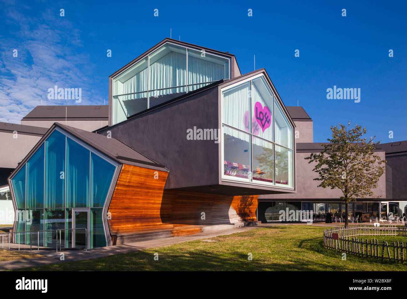 Germany, Baden-Wurttemburg, Weil am Rhein, Vitra Architectural Design Campus, Vitra Haus, designed by Herzog and de Meuron, 2010 Stock Photo