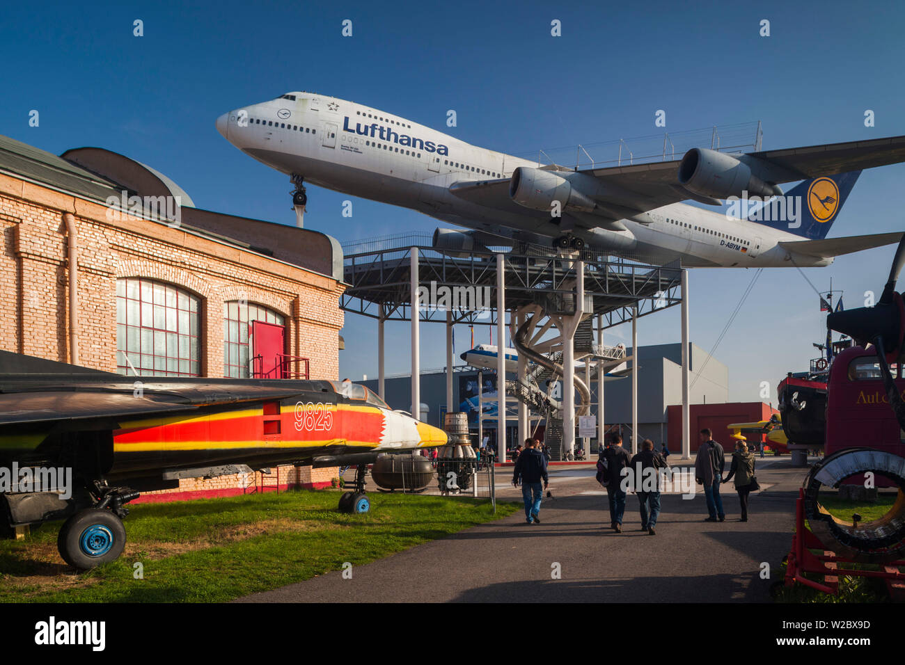 Germany, Rheinland-Pfalz, Speyer,Technik Museum Speyer, airliner display including elevated Boeing 747 Stock Photo