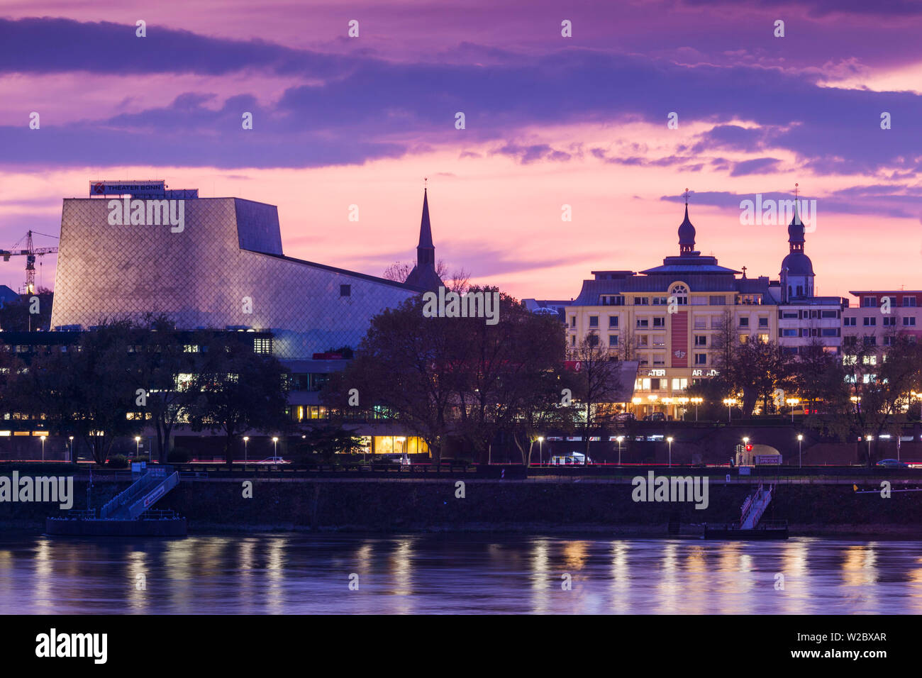 Germany, Nordrhein-Westfalen, Bonn, Rhein Riverfront and Bonn Opera building, dusk Stock Photo