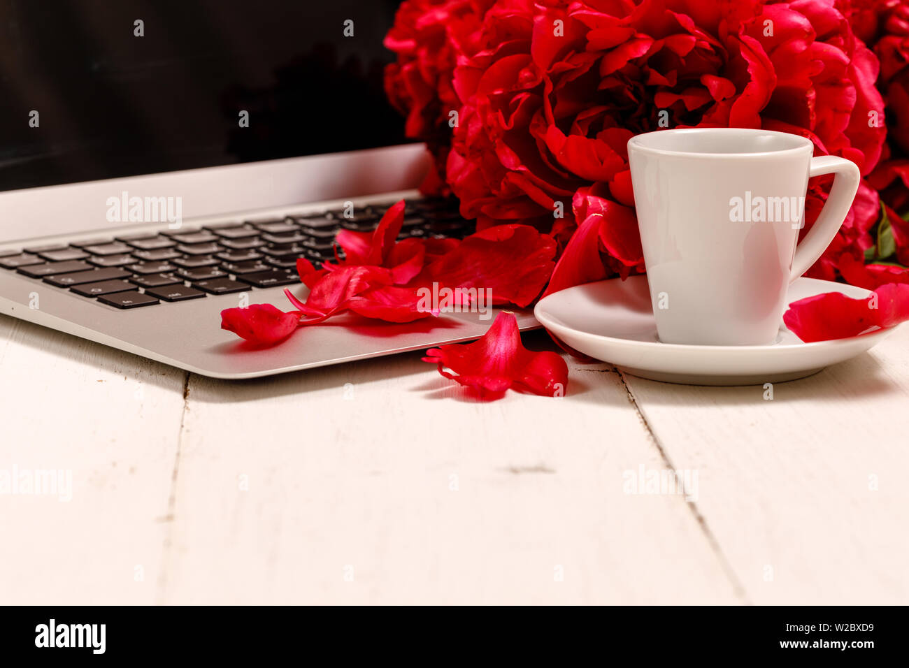 View Women S Office Desk With Flowers Female Workspace With Laptop Flowers Peonies Accessories Notebook Glasses Cup Of Coffee On White Backgroun Stock Photo Alamy