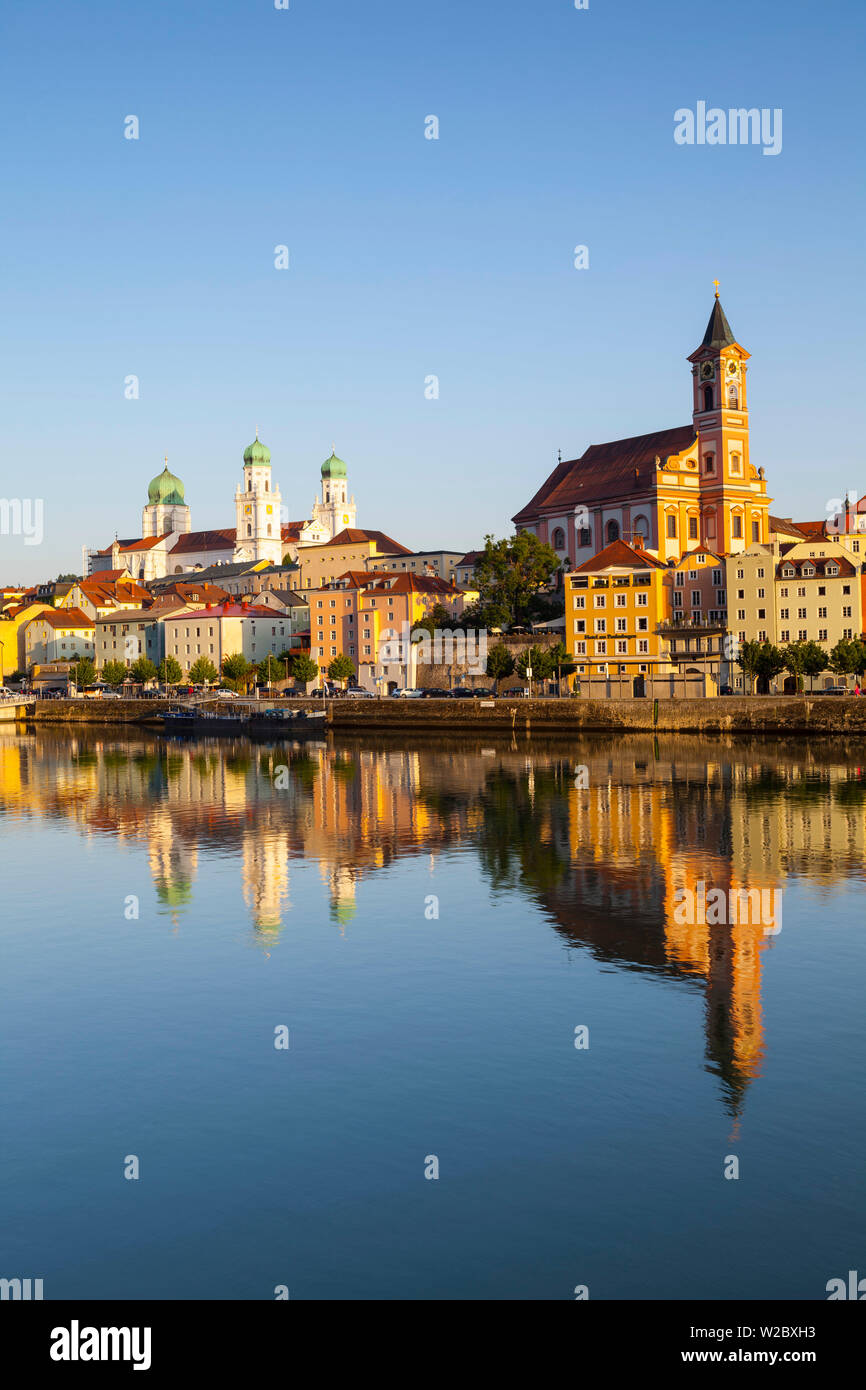 St. Paul's church & St. Stephan's Cathedral illuminated at sunset, Passau, Lower Bavaria, Bavaria, Germany Stock Photo