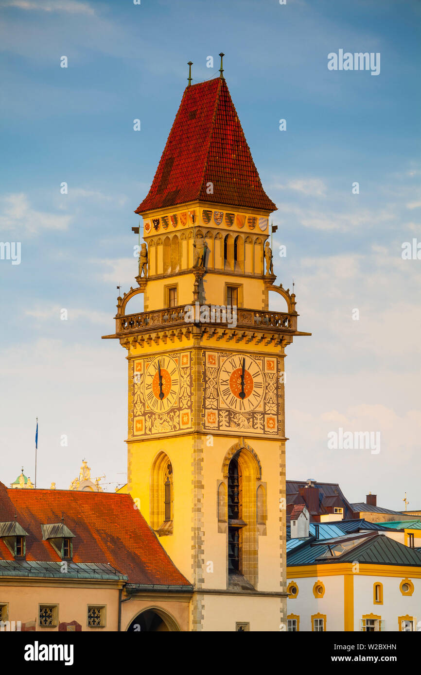 Town Hall (Rathaus) Clock Tower illuminated at sunrise, Passau, Lower Bavaria, Bavaria, Germany Stock Photo