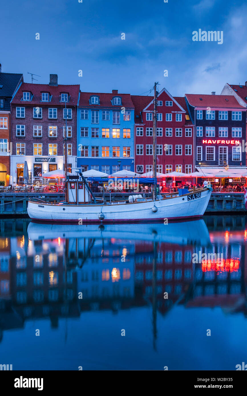 Denmark, Zealand, Copenhagen, Nyhavn harbor, evening Stock Photo