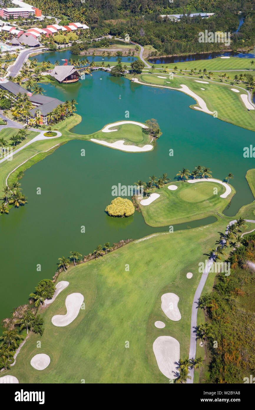 Dominican Republic, Punta Cana, View of Â Barcelo Bavaro Palace Deluxe Hotel and The Lakes Golf Course by P.D. Dye Stock Photo