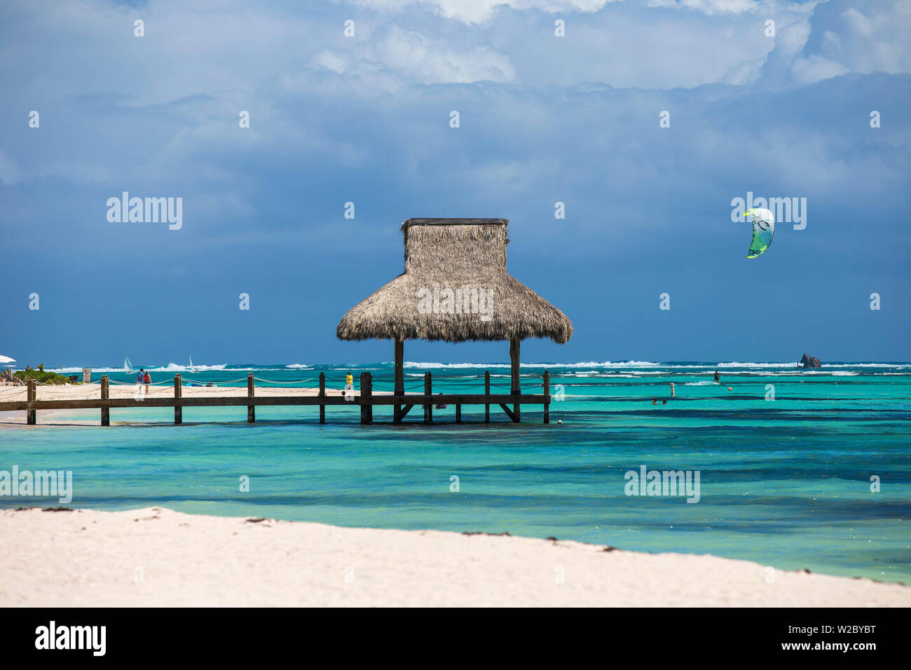 Dominican Republic, Punta Cana, Playa Blanca, Wooden pier with thatched hut Stock Photo