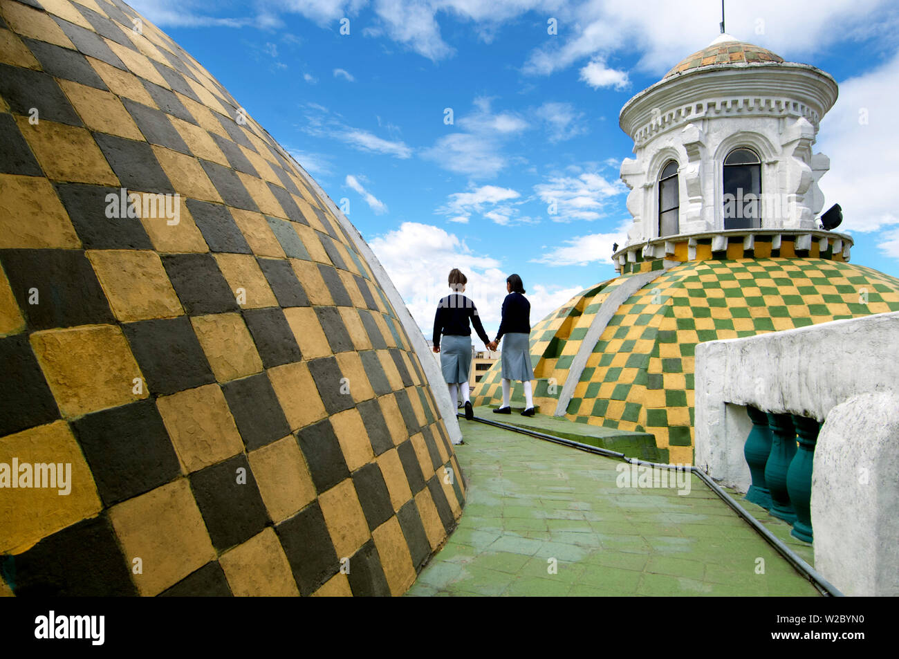 Checkered Tiled Green And Gold Domes of The Metropolitan Cathedral of Quito, La Catedral, Uniformed Students Provide Rooftop Tours, Mudejar Architectural Style, Old Town, Centro Historico, UNESCO World Cultural Heritage Site, Quito, Ecuador Stock Photo