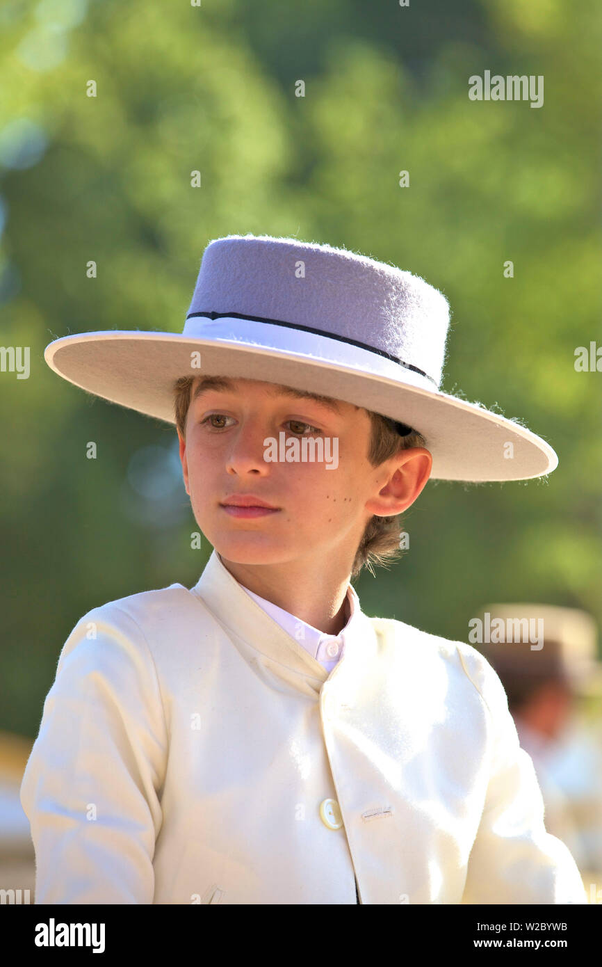 Spanish Boy In Traditional Costume, Annual Horse Fair, Jerez de la Frontera, Cadiz Province, Andalusia, Spain Stock Photo
