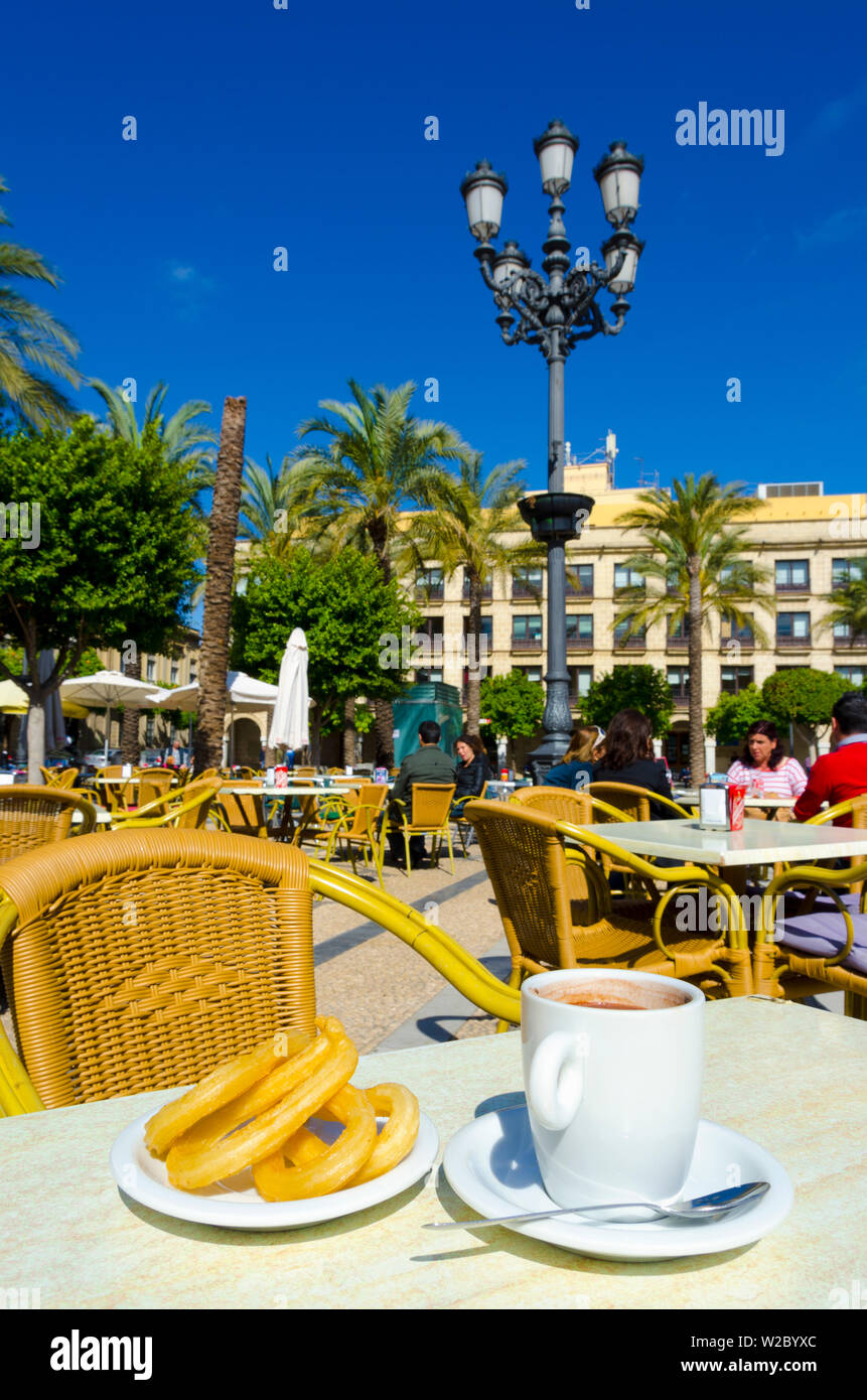 Spain, Andalucia, Cadiz Province, Jerez de la Frontera, Plaza del Arenal, Chocolate con Churros, drinking chocolate and doughnut Stock Photo