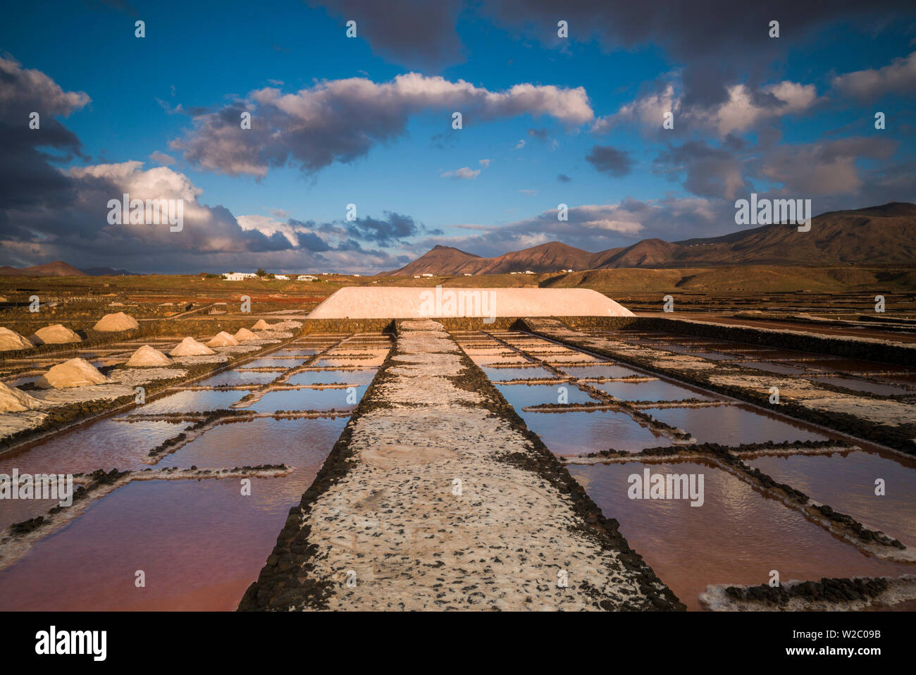 Spain, Canary Islands, Lanzarote, El Golfo, Salinas de Janubio, salt evaporation pans, sunset Stock Photo