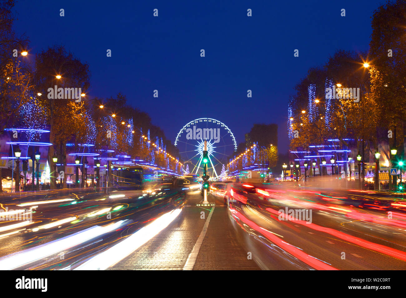 Big Wheel And Xmas Decorations, Avenue des Champs-Elysees,  Paris, France, Western Europe. Stock Photo