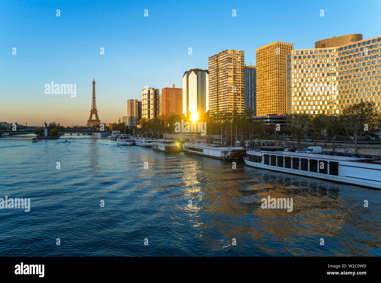 Night view of River Seine with high-rise buildings on the Left Bank, and Eiffel Tower, Paris, France, Europe Stock Photo