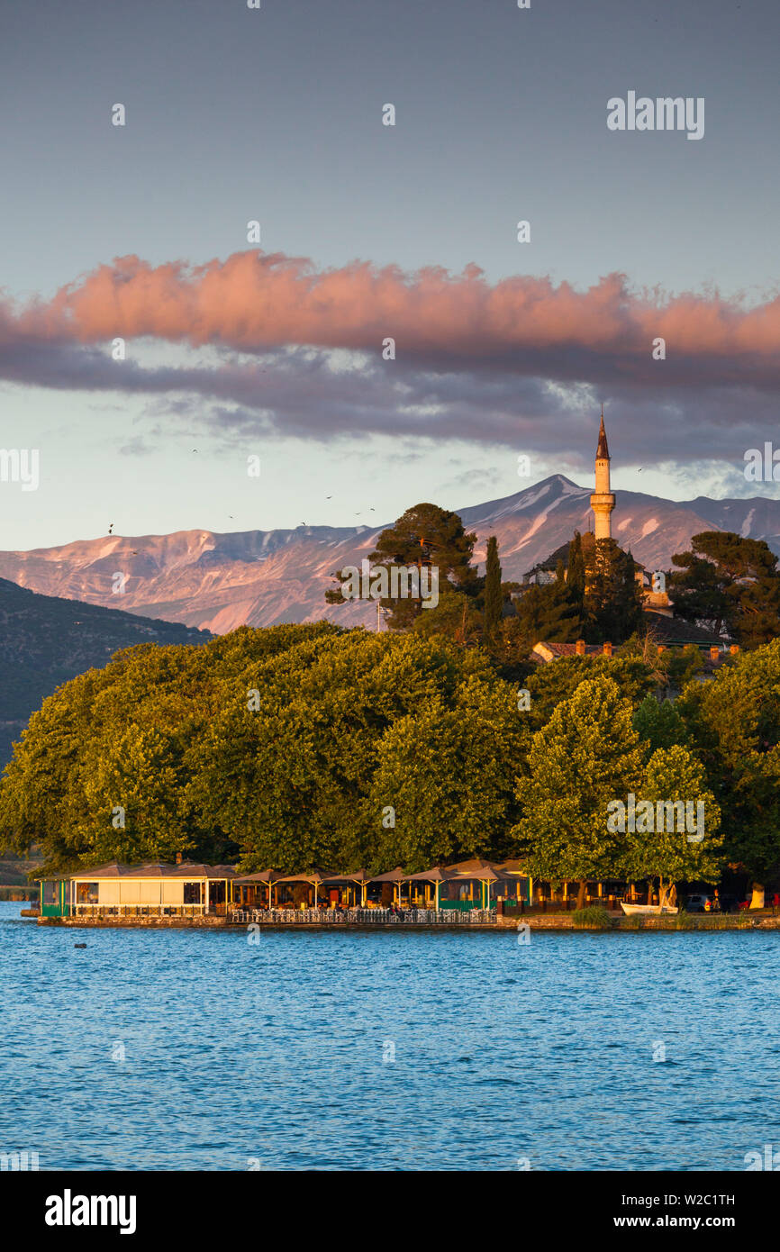 Greece, Epirus Region, Ioannina, Municipal Ethnographic Museum building and Lake Pamvotis, sunset Stock Photo