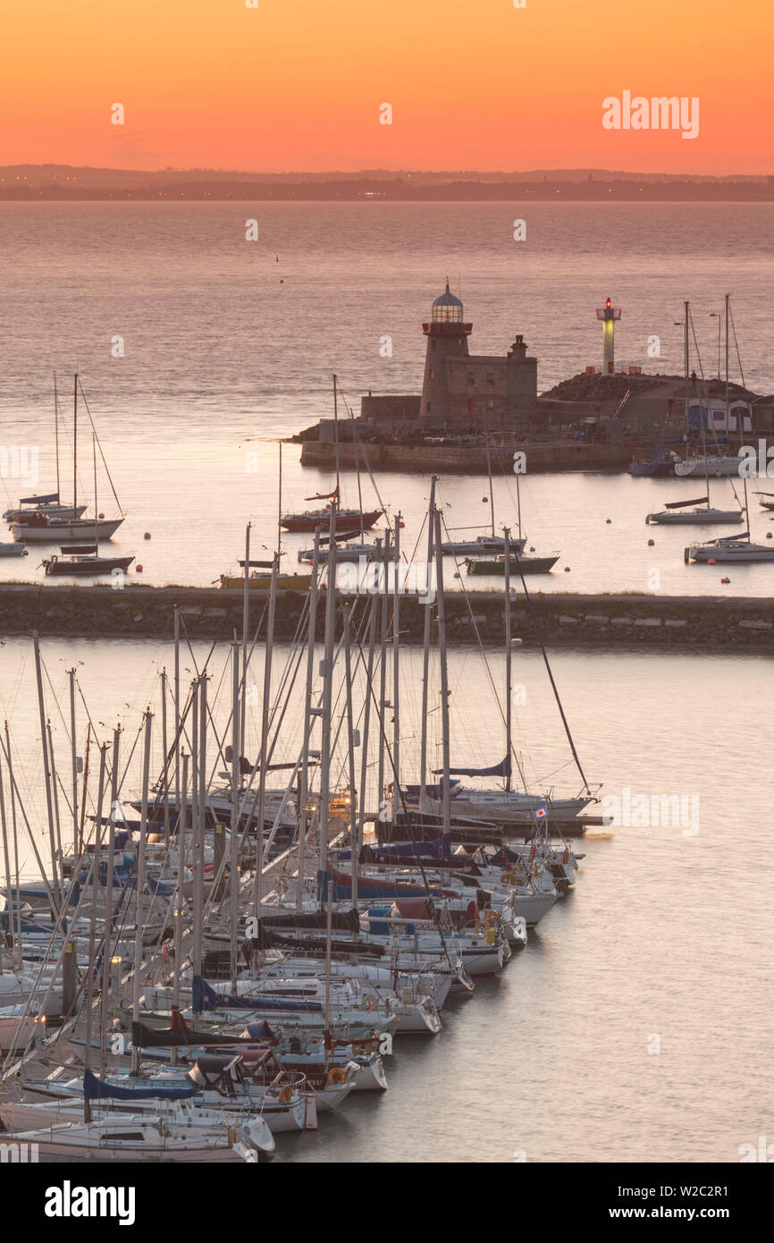 Ireland, County Fingal, Howth, Howth Harbor, elevated view, dusk Stock Photo