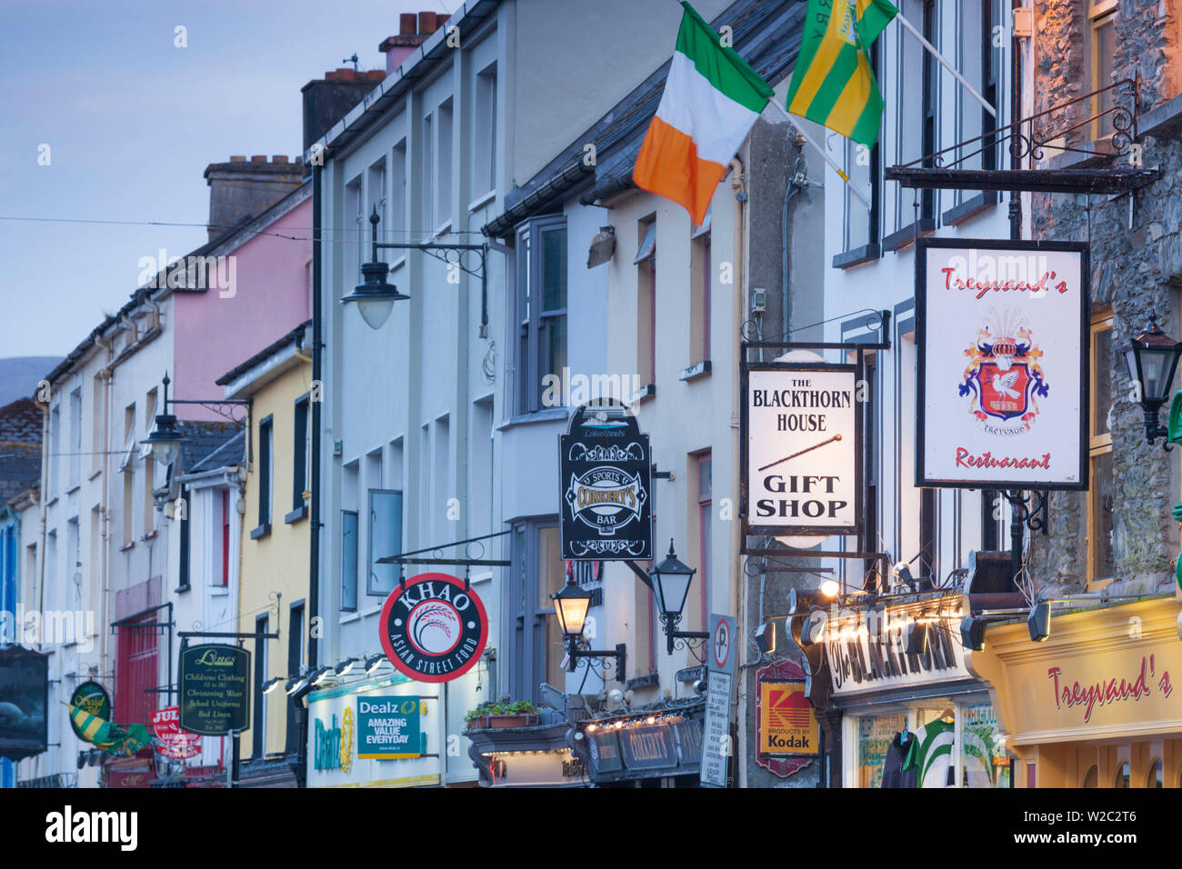 Ireland, County Kerry, Ring of Kerry, Killarney, Main Street signs, dusk Stock Photo