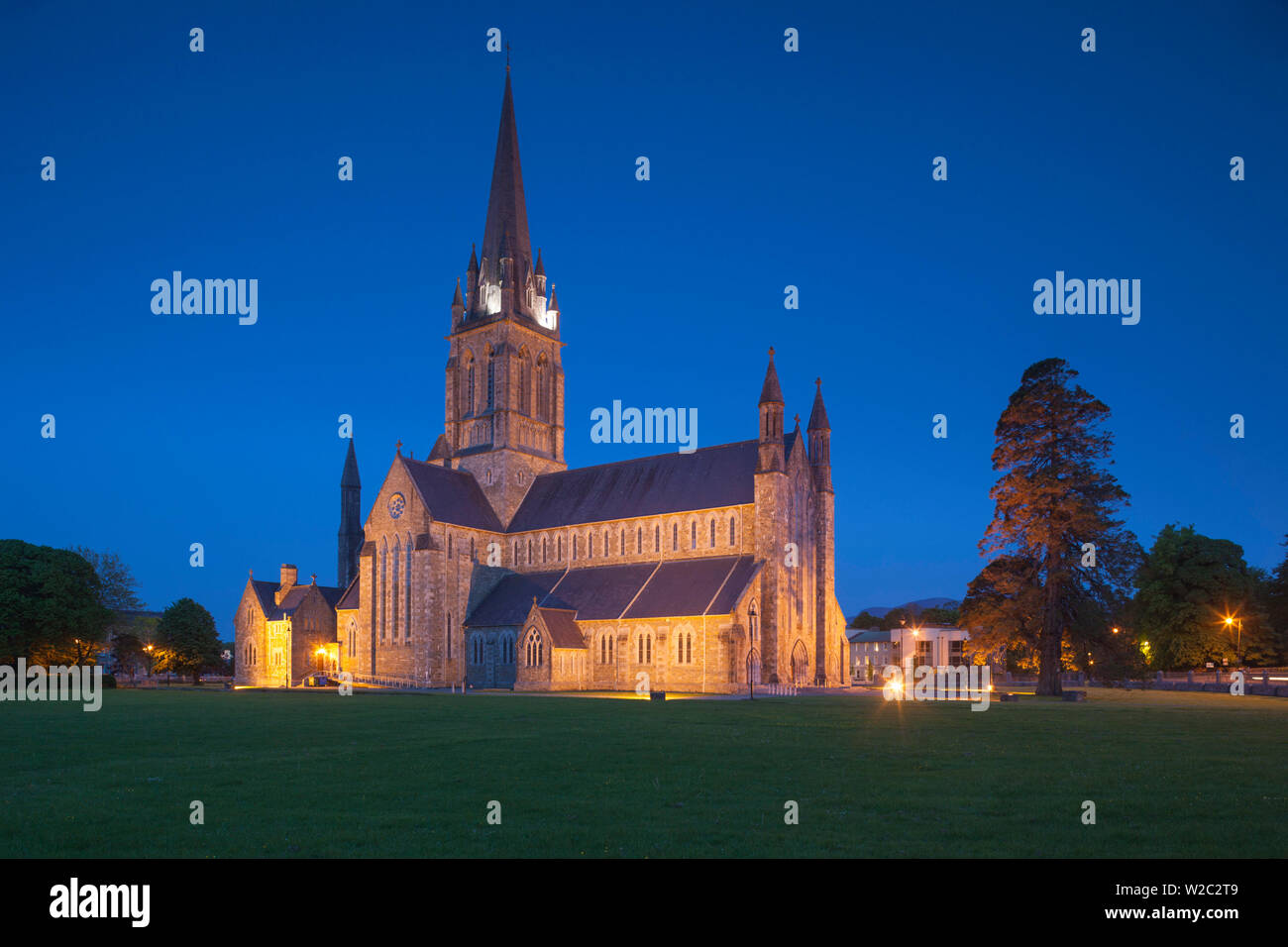 Ireland, County Kerry, Ring of Kerry, Killarney, St. Mary's Catholic Cathedral, exterior, dusk Stock Photo