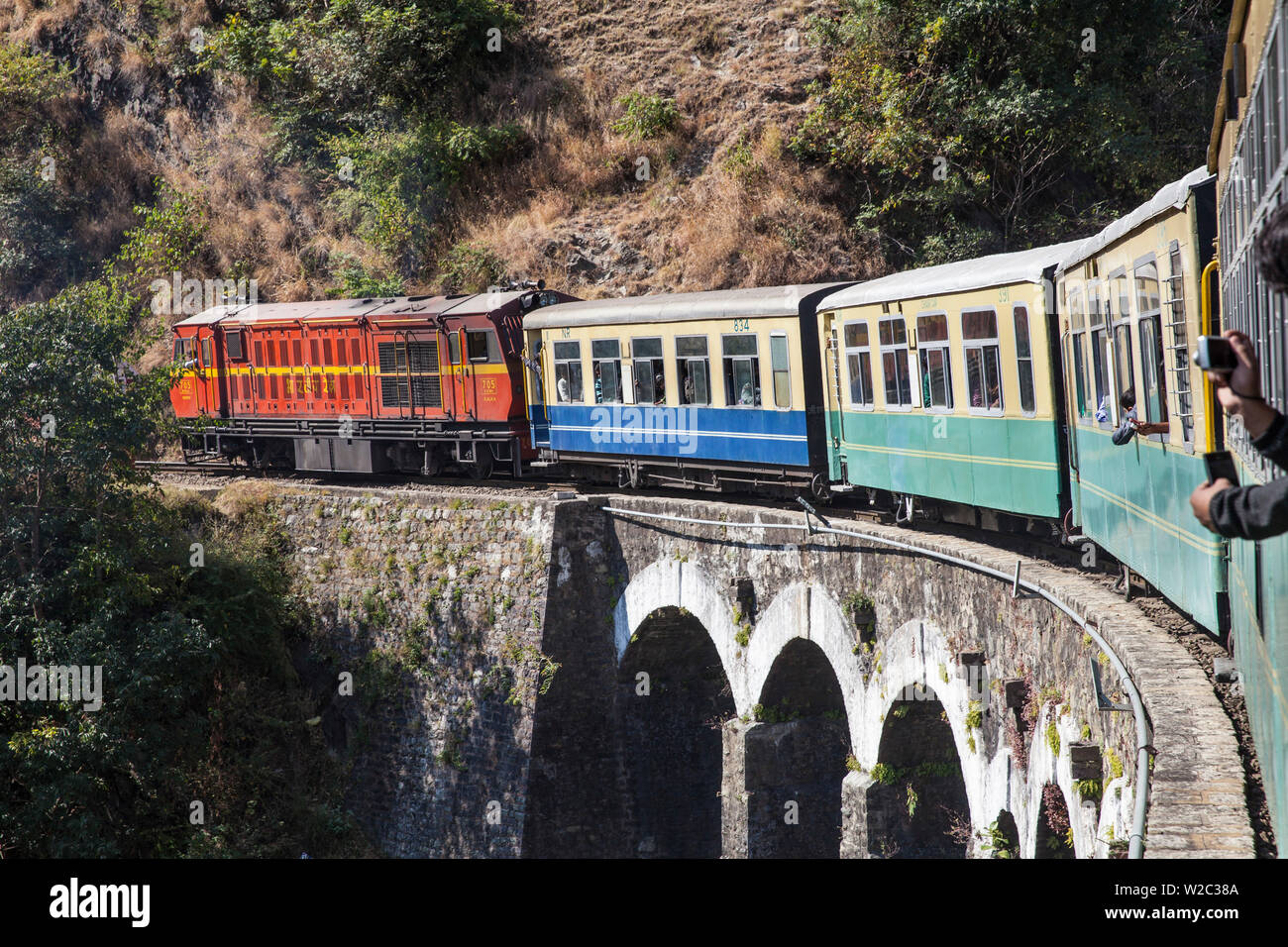 India, North-West India , The Kalkaâ€“Shimla Railway, The Himalaya Queen toy train, Arch gallery bridge no 493 Stock Photo