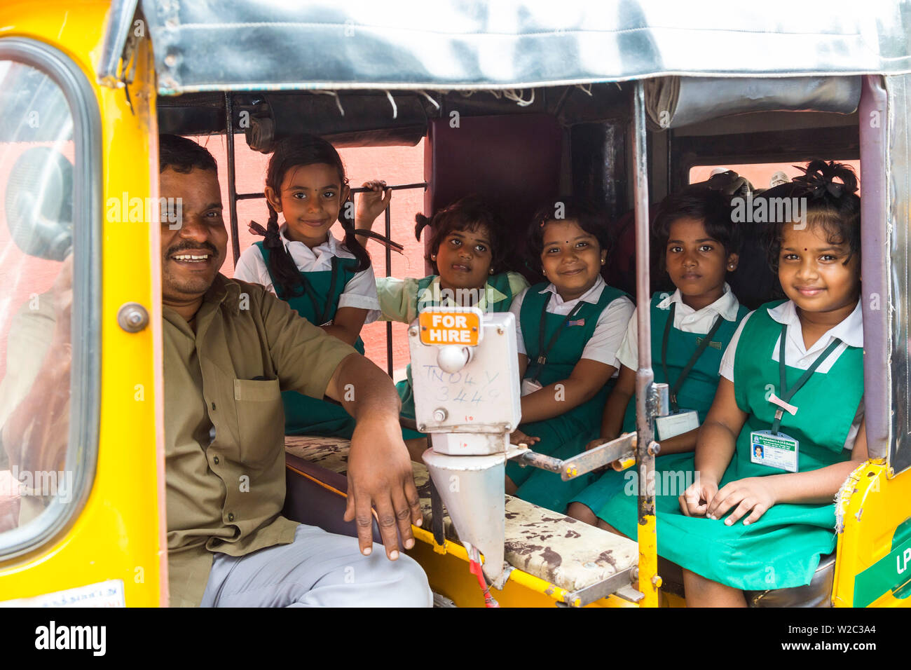 School children in auto-rickshaw, Chennai, (Madras), India Stock Photo
