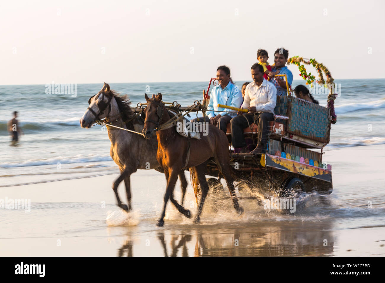 Horse cart rides on beach, Mangalore, Karnataka, India Stock Photo