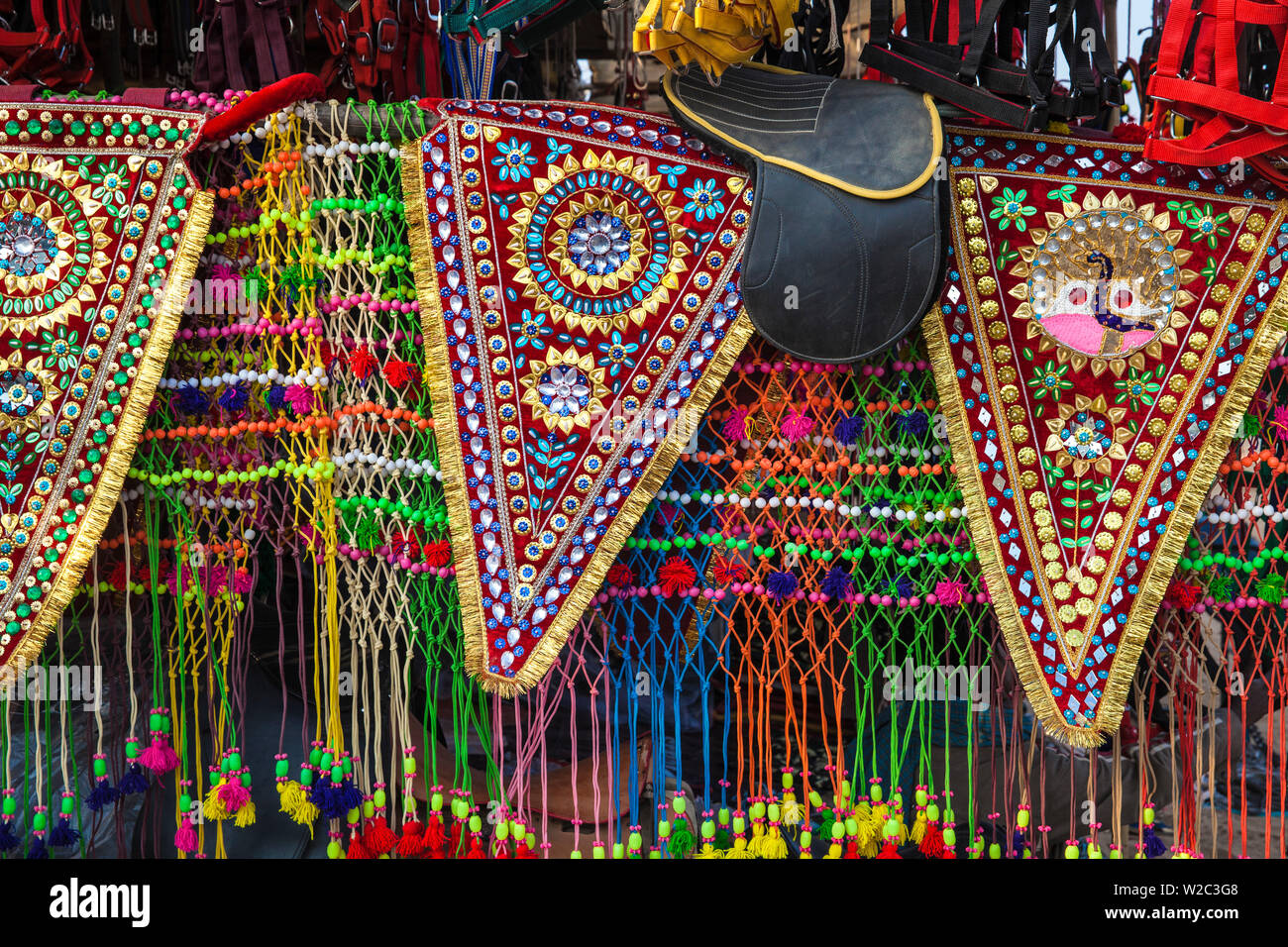 India, Rajasthan, Pushkar, Stall selling camel decorations and embellishments at Pushkar Camel Fair Stock Photo