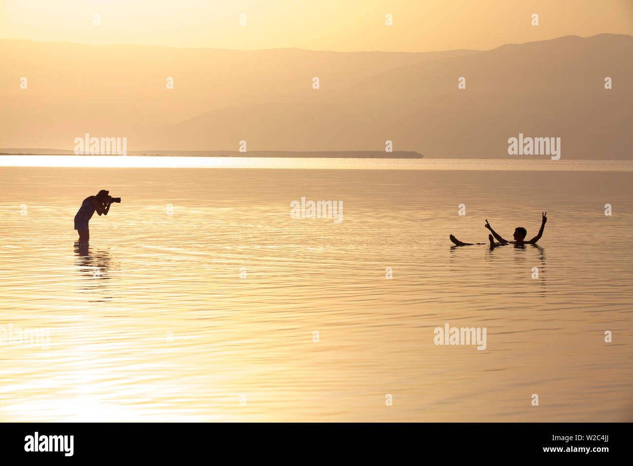 Floating In The Dead Sea (lowest place on Earth), Ein Bokek, Israel, Middle East Stock Photo