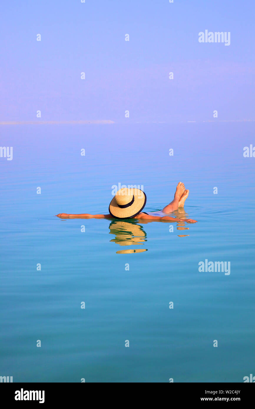 Floating In The Dead Sea (lowest place on Earth), Ein Bokek, Israel, Middle East (MR) Stock Photo