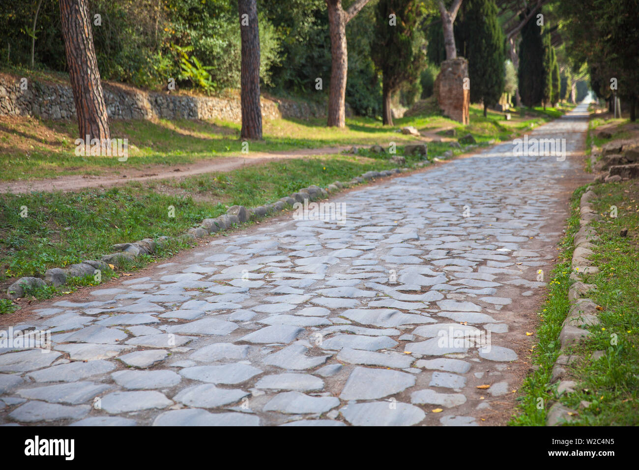 Italy, Lazio, Rome, Ancient Appian Way - Ancient Roman road Stock Photo